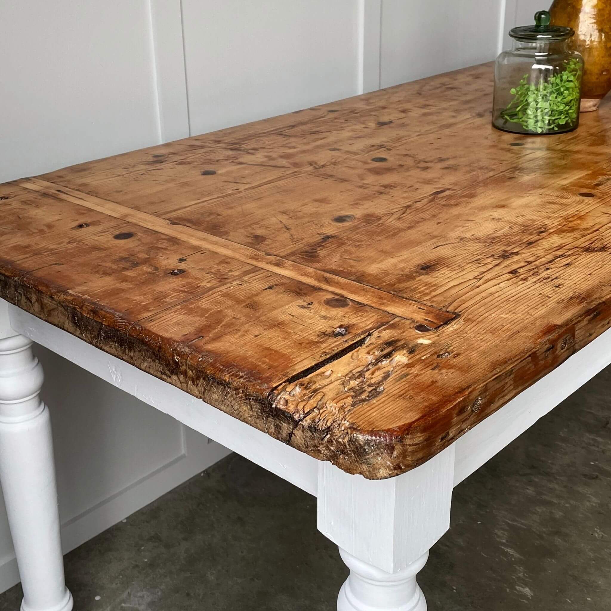 Top of country house dining table and glass jar