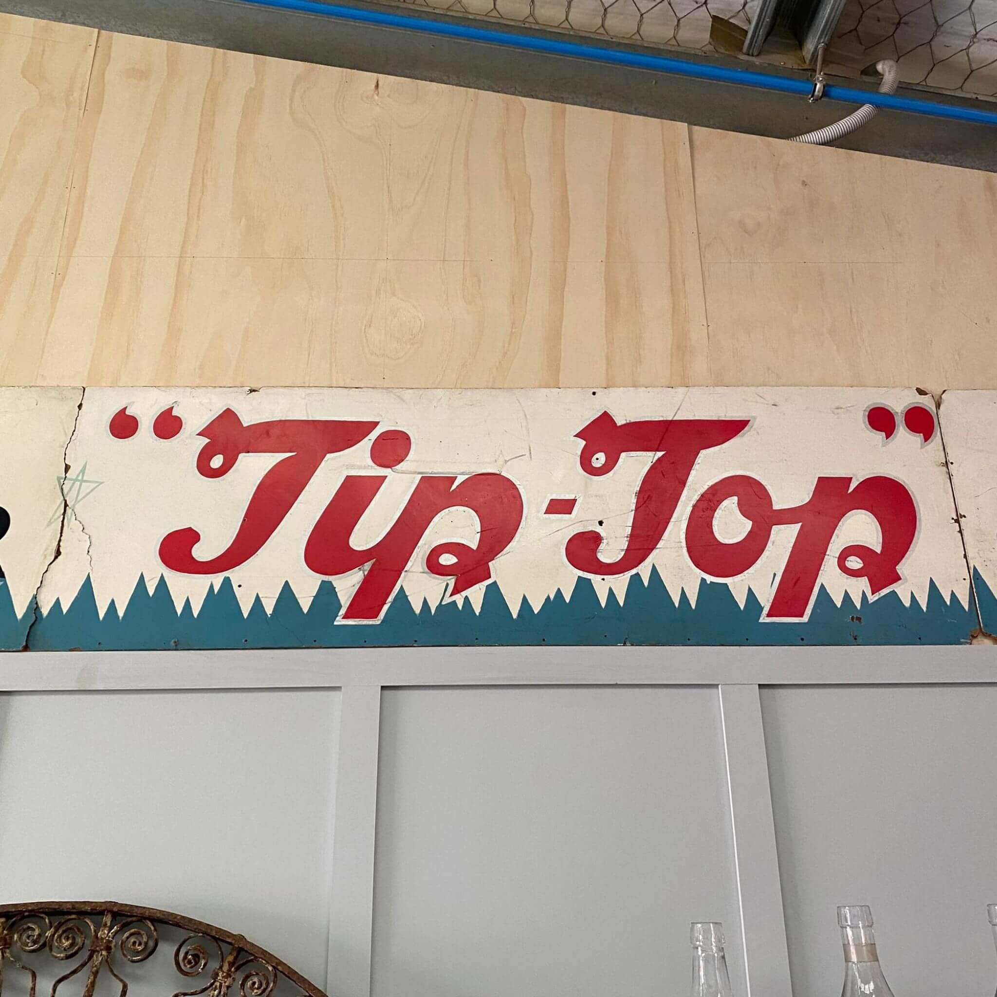 Antique tip top sign