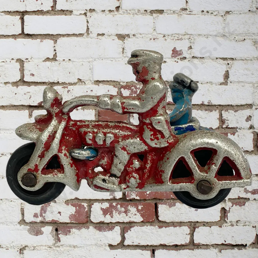 Size 9.5cm Long x 5.5cm Wide x 6.5cm High. Earlier black wheels, original paint. Condition fair.