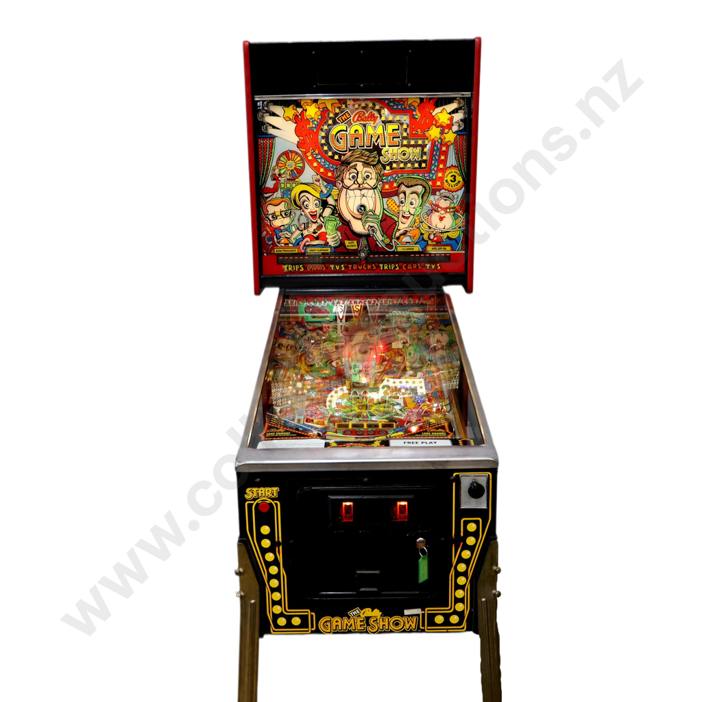 56cm x 1.32m x 1.98m Only 2,500 of these games were made in 1990. We think this might be the only one in New Zealand! As you play the game, you collect the various prizes all over the playfield. The truck, the car, the holiday, the TV … just like a real game show! When you’ve collected all the prizes, you can start the Super Showcase Multiball and collect the big jackpots! You can also loop the centre ramp over and over and spin the prize wheel in the centre of the playfield to win big points and awards. Th