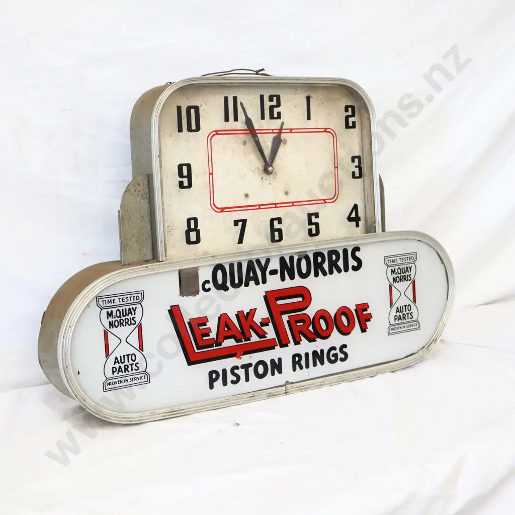 Size 64cm Long x 10cm Wide x 45cm High. Both the clock and the light are working. Unusual item from the 1950s.