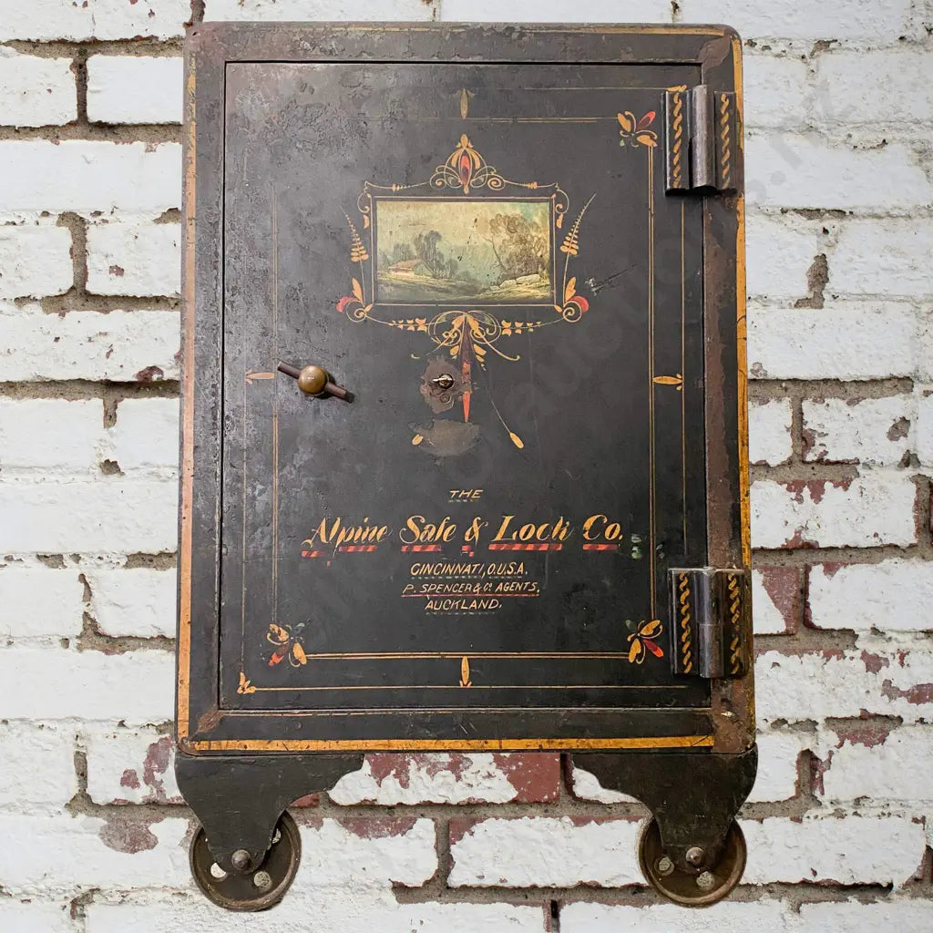 Size 44cm Long x 56cm Wide x 1.13m High. With Key, patented June 1888, P Spencer agent Auckland. The artwork is all hanpainted. Condition good.