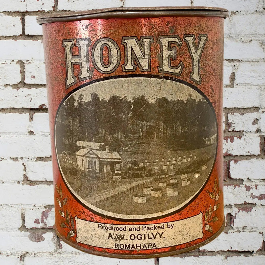 Size 19cm High 17cm Diameter. RARE excellent pictorial honey tin, great lithography. Condition good.