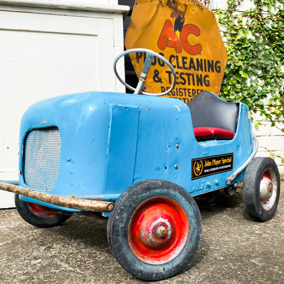 A Vintage Stock Car Pedal Car