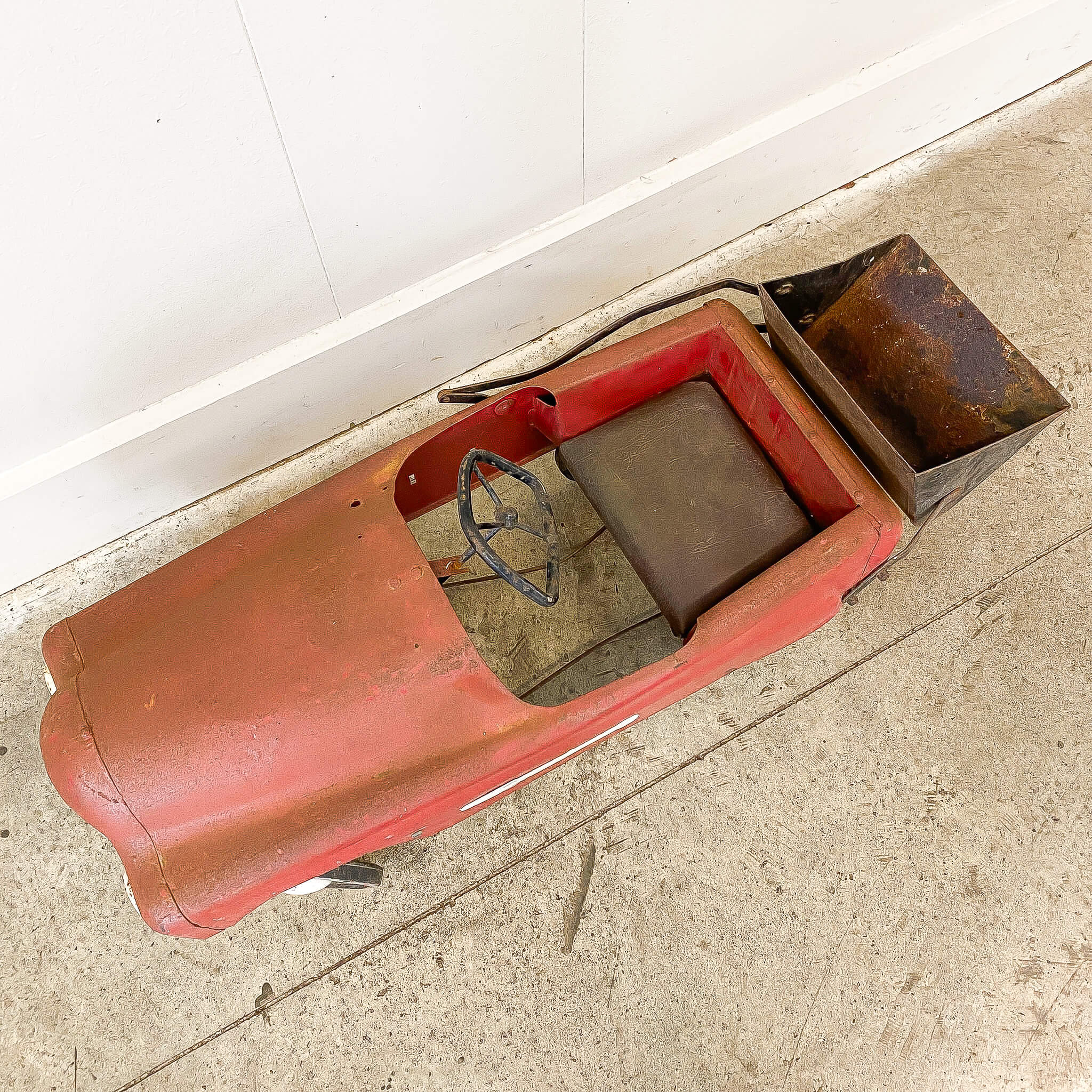 A Vintage Triang Pedal Car