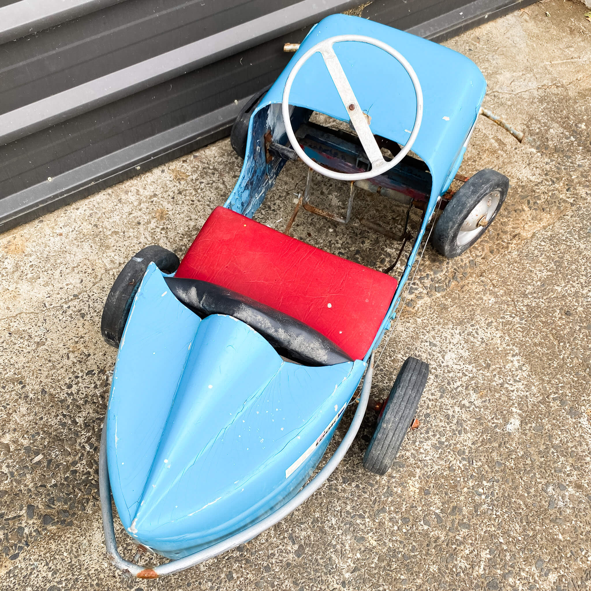 A Vintage Stock Car Pedal Car