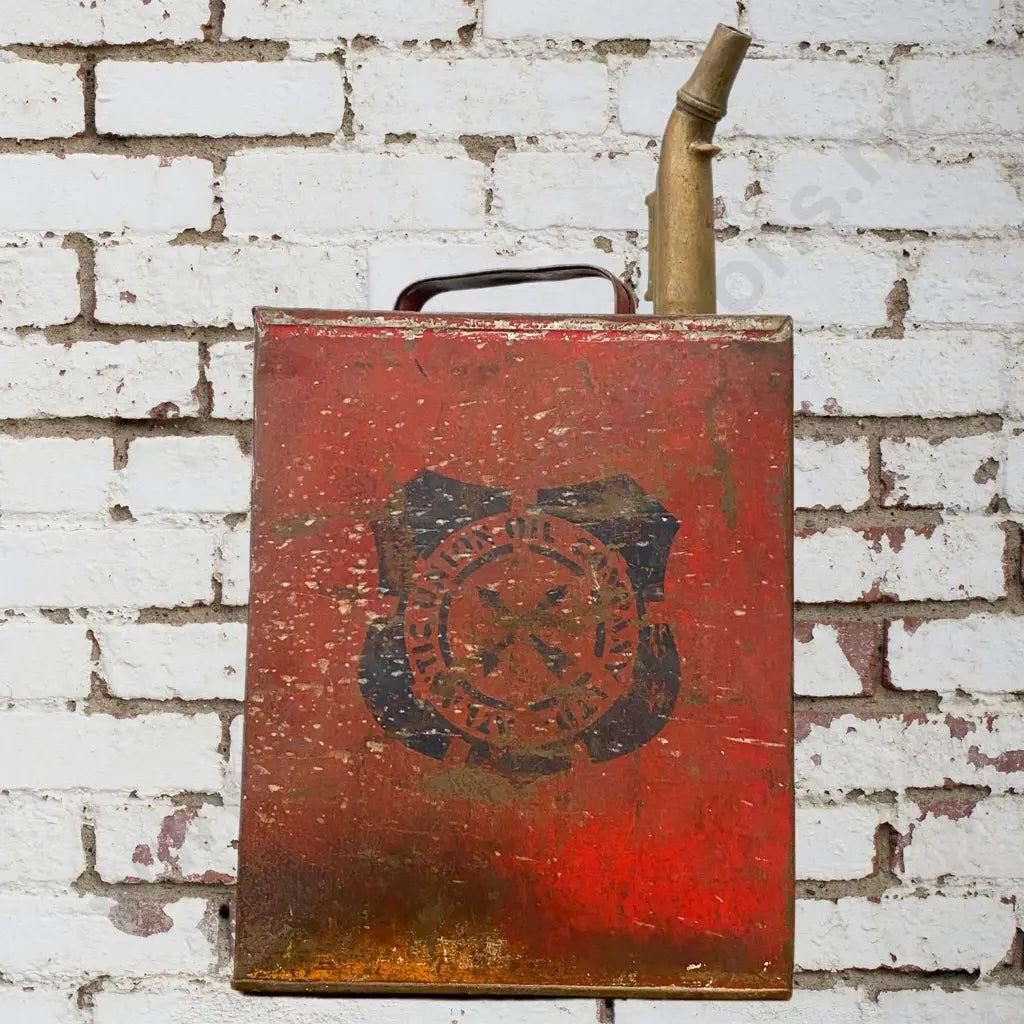 Size 25cm long x 15cm Wide x 35cm High. Early, some paint splashed present, brass spout. Condition good.