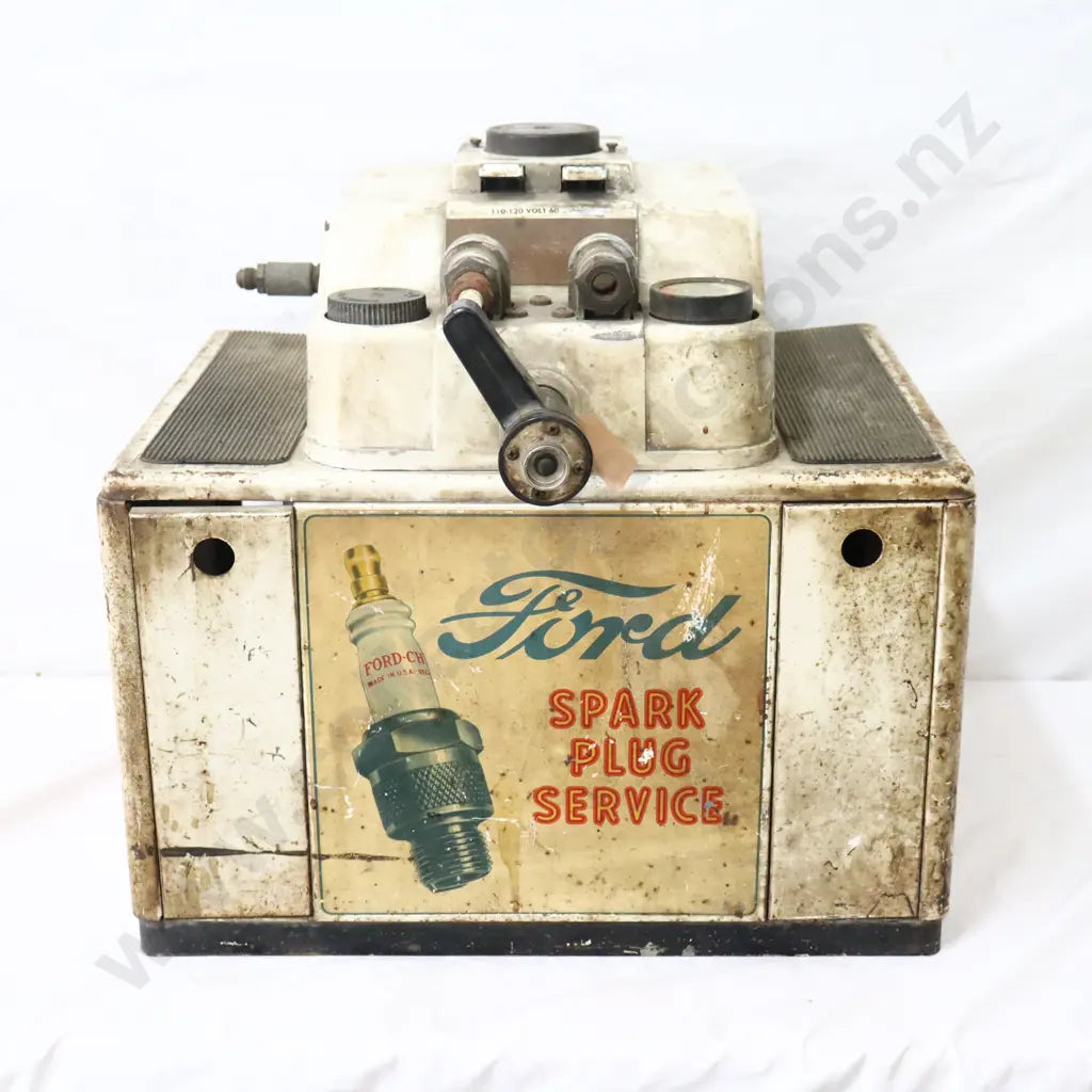 Size 47cm Long x 35cm Wide x 45cm High. Rare Champion Spark Plug Cleaning Machine with original Ford waterslide transfer to front, very rare, seldom seen.