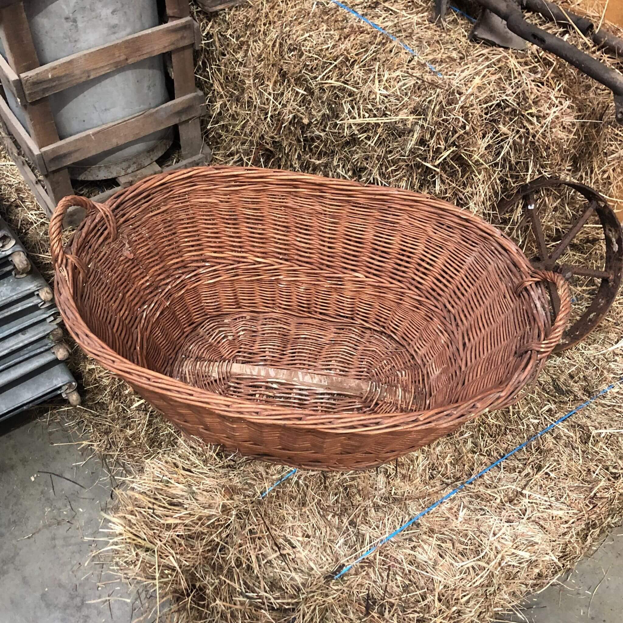 A Large Maroon Wicker Basket