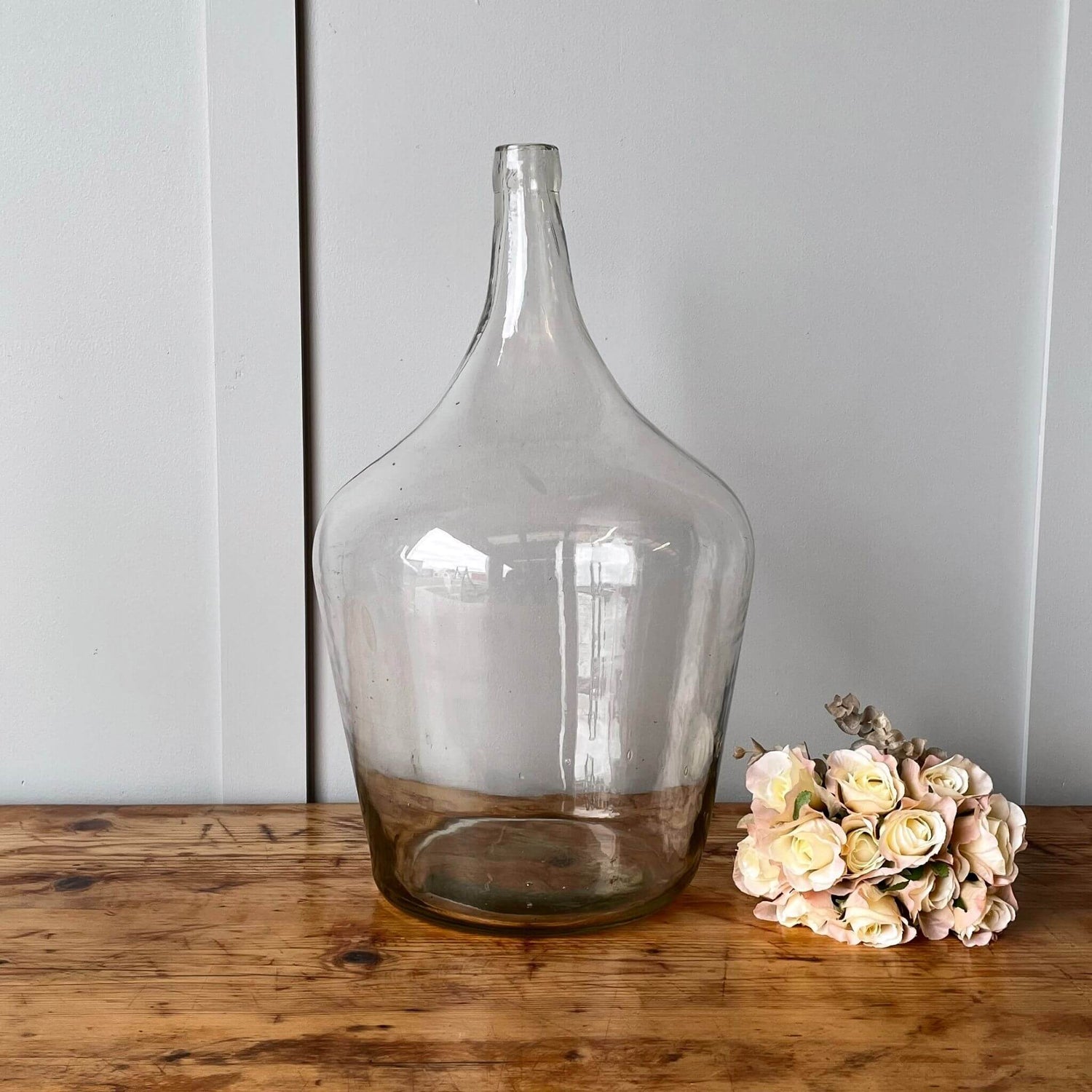 A vintage glass carboy