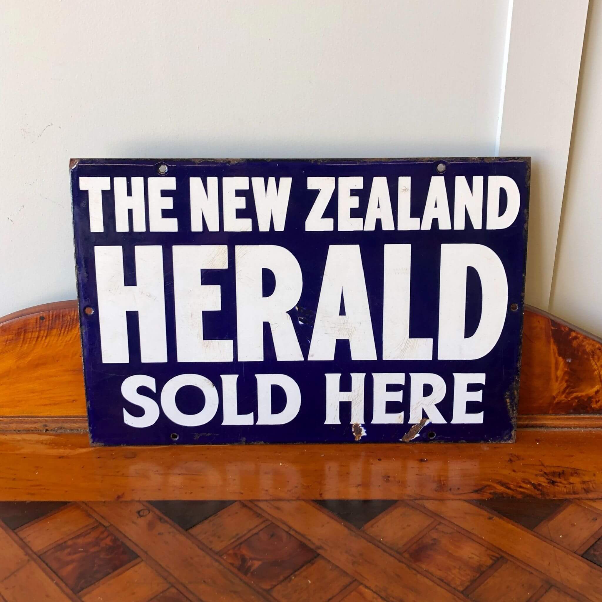 Vintage advertising sign, enamel sign The New Zealand Herald