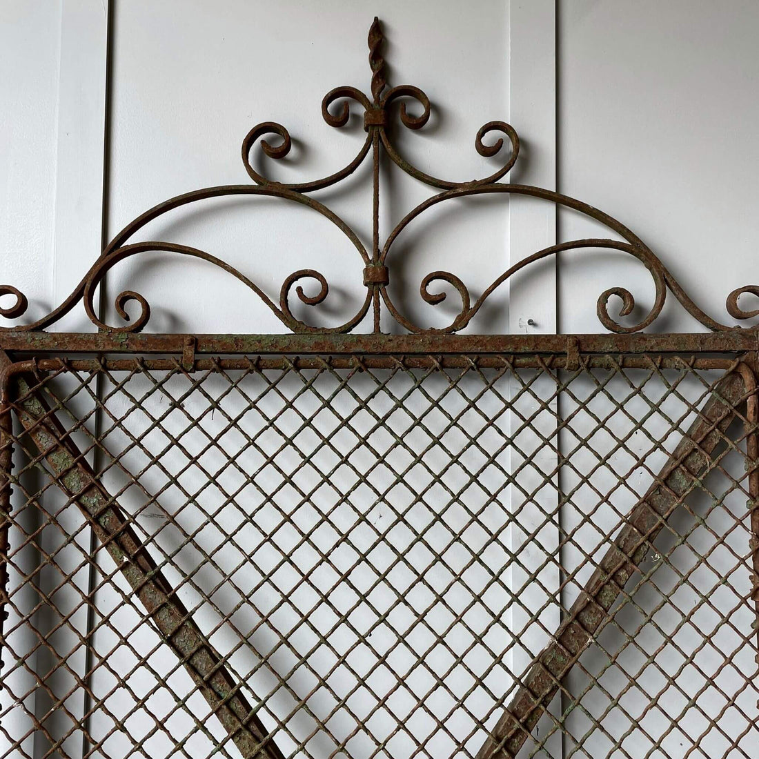 Antique wrought iron garden gate