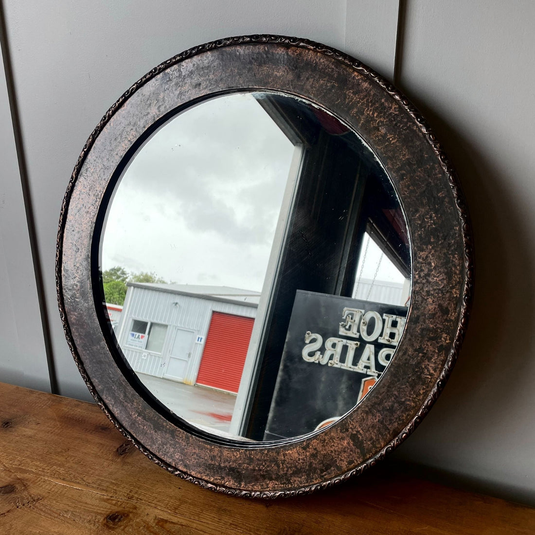 Liberty of London hand beaten copper mirror