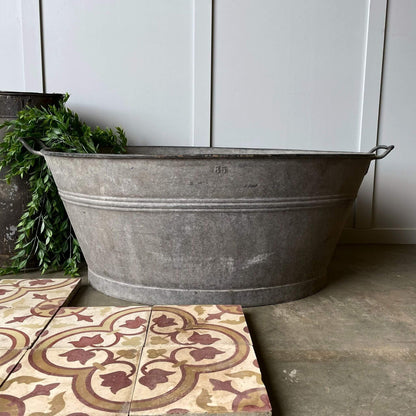 Antique tin bath tub for home or garden decor, splash tub