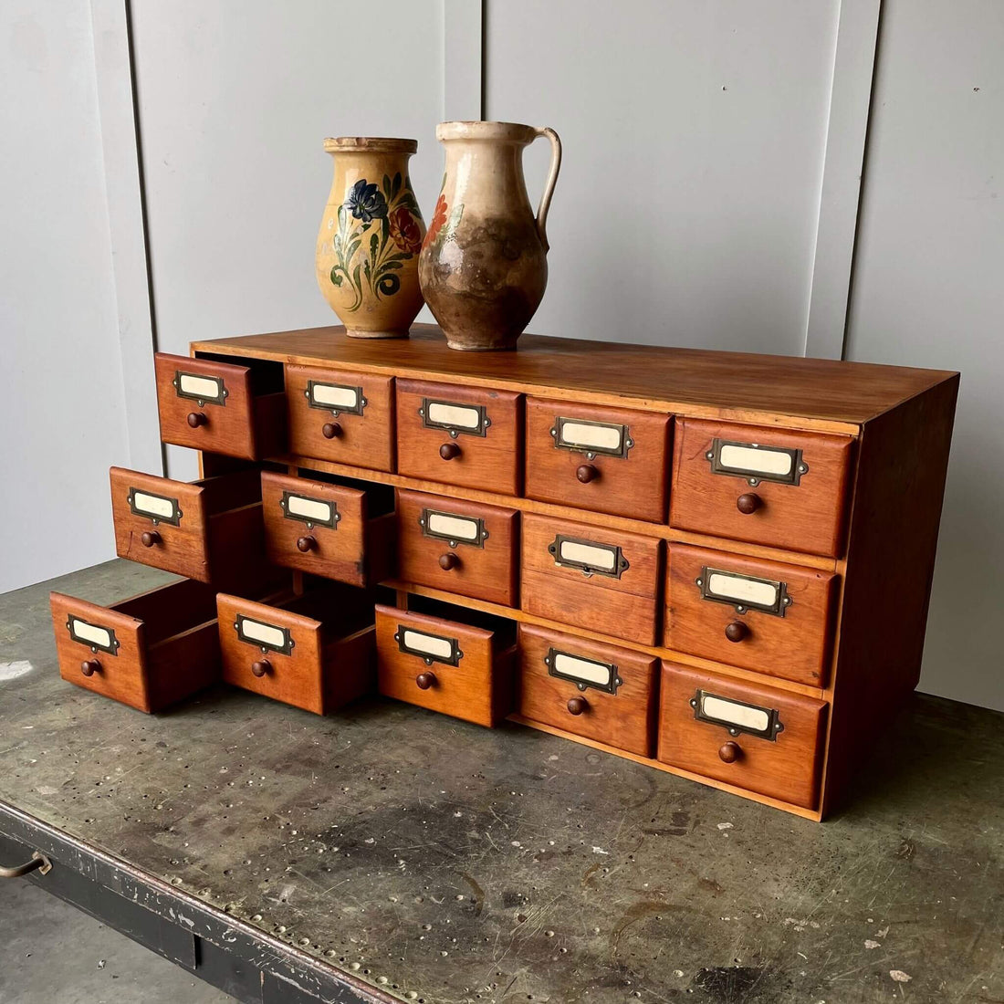 Vintage industrial storage bank of draws