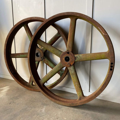 Antique garden decor cast iron wheels