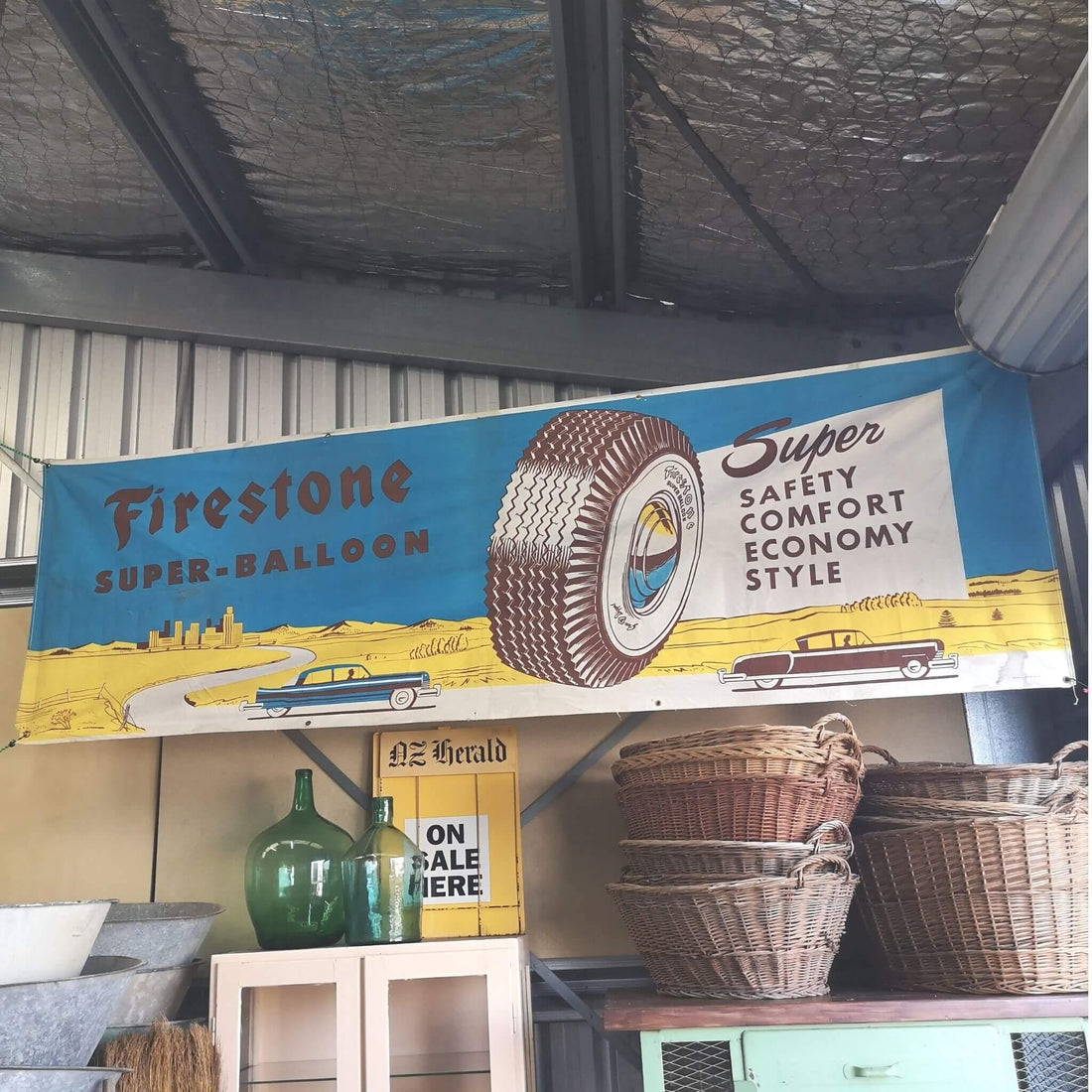 A large firestone tyres canvas banner
