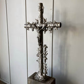 An old French cast iron cross, antique garden decor