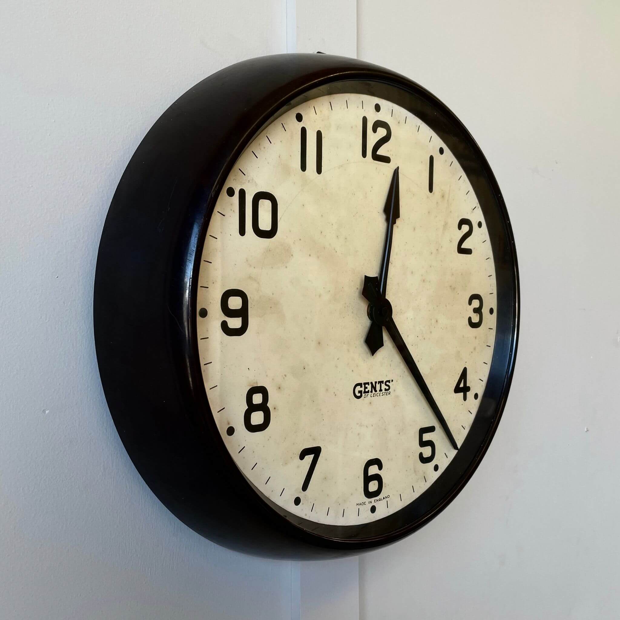 Bakelite gents wall clock