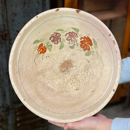 a large terracotta pottery fruit bowl