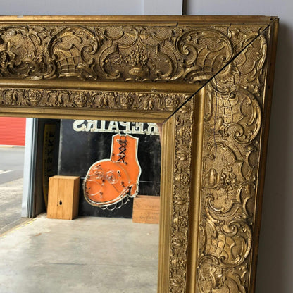Corner of antique mirror gilt framed