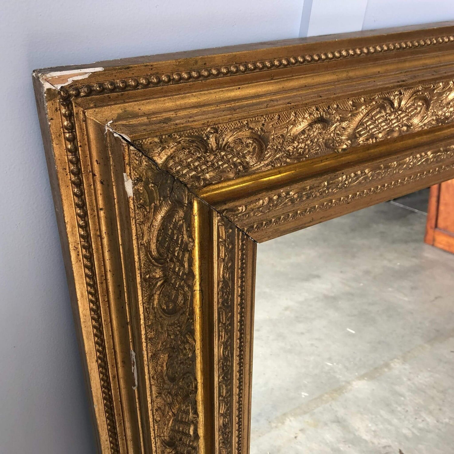 Stately antique mirror