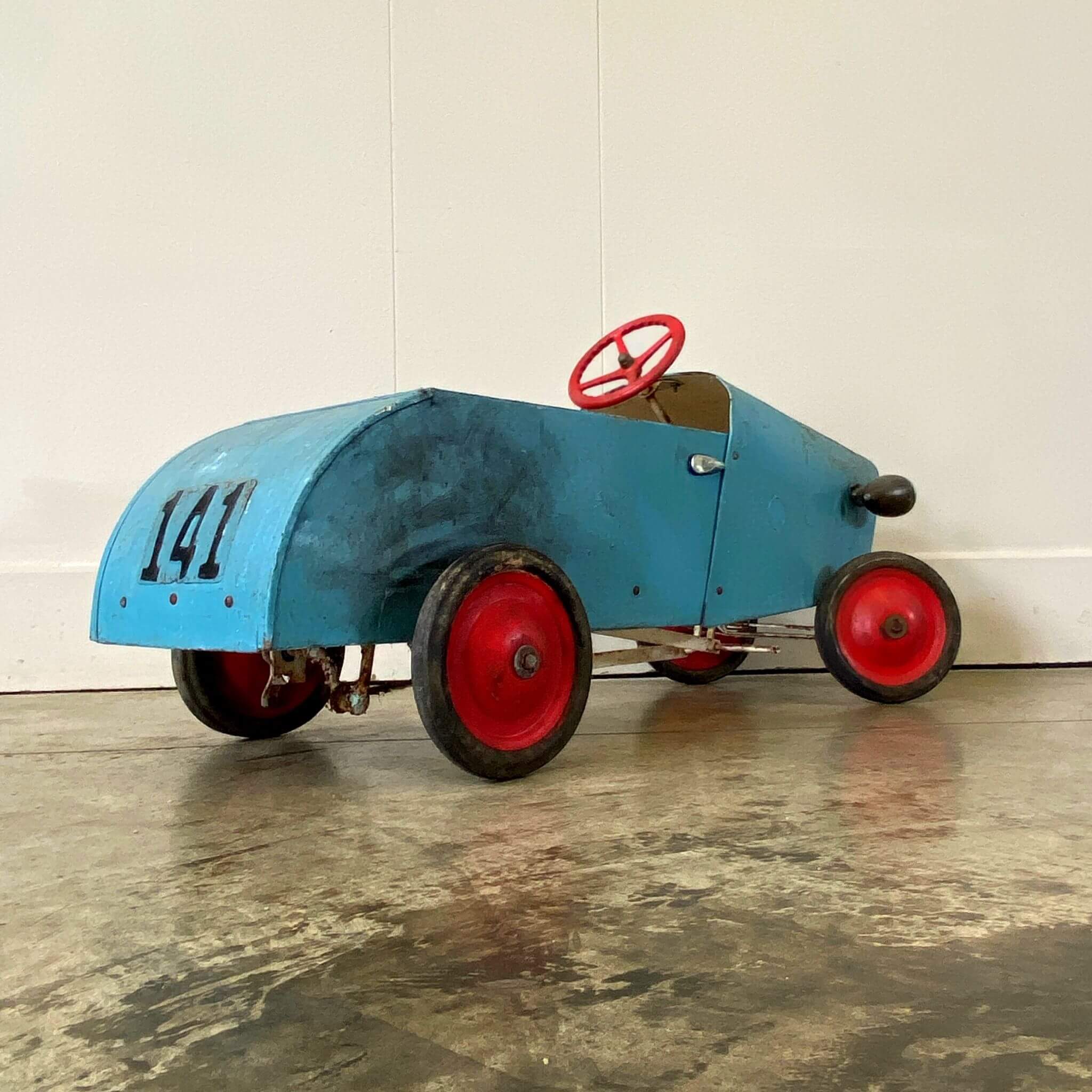 A Vintage Pedal Car