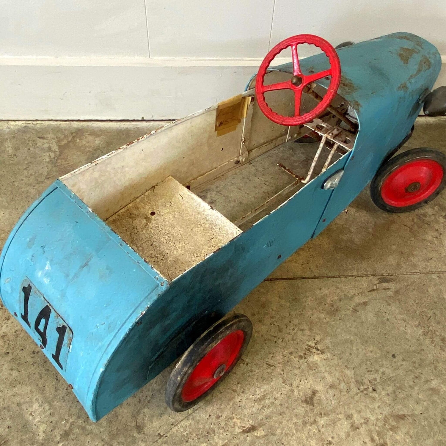 A Vintage Pedal Car