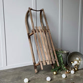 Christmas snow sled, vintage buckets and ball balls